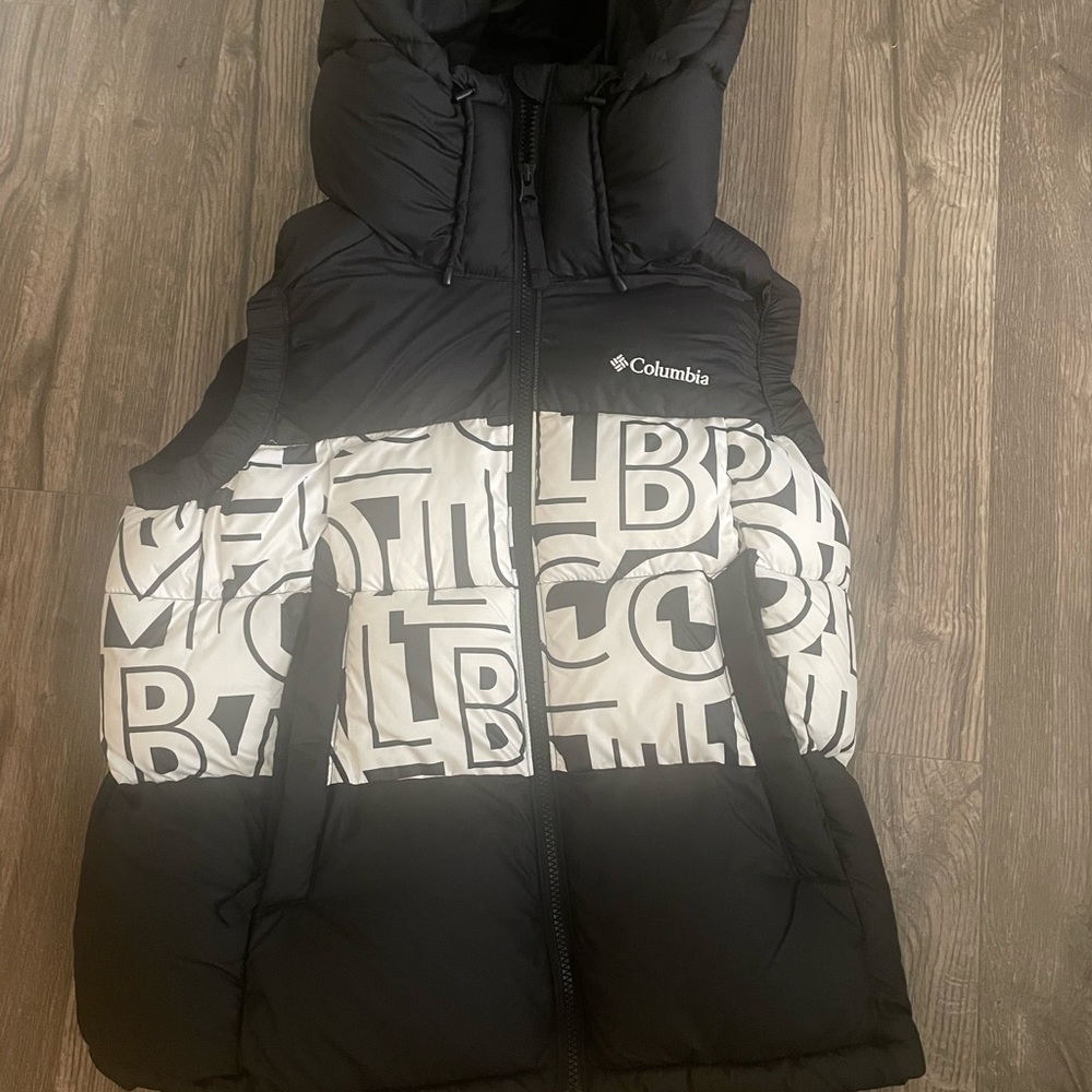 Columbia black and white puffer. Really thick. Like new